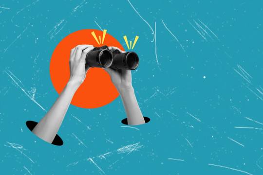 hands with binoculars looking into the distance