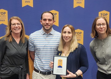 Core team members at accepting award