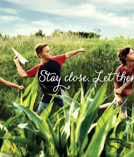 billboard of ad showing a girl blowing bubbled