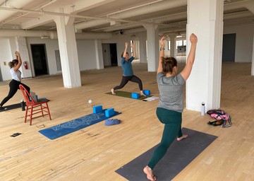 Core team members doing yoga